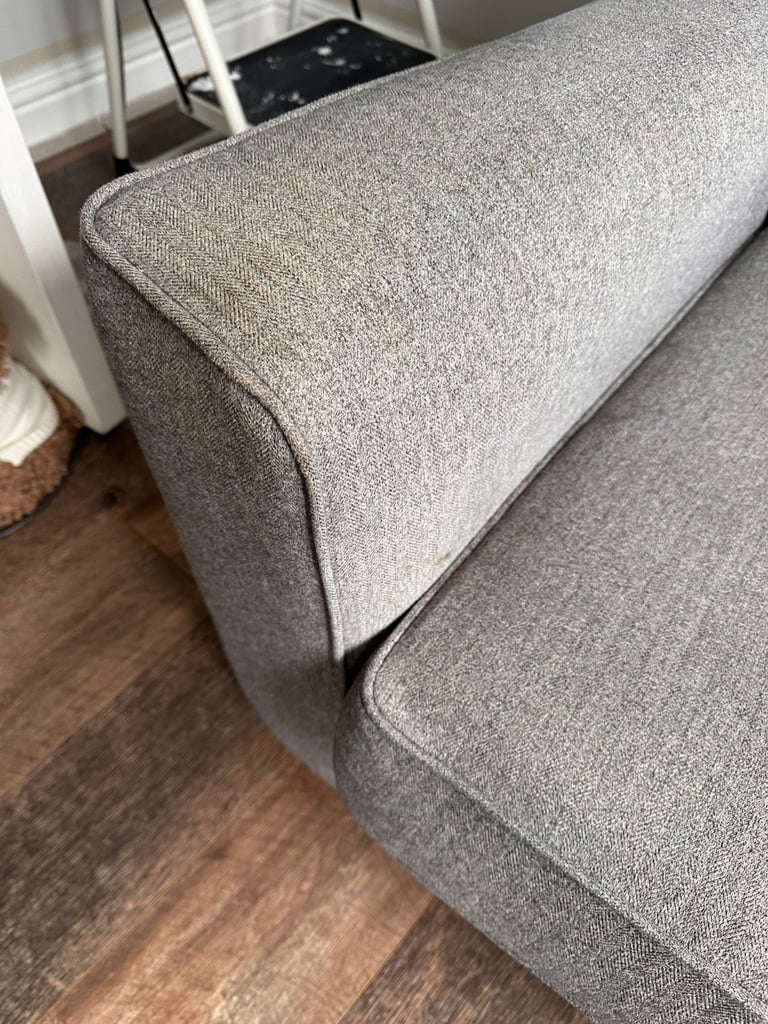 DFS grey armchair 