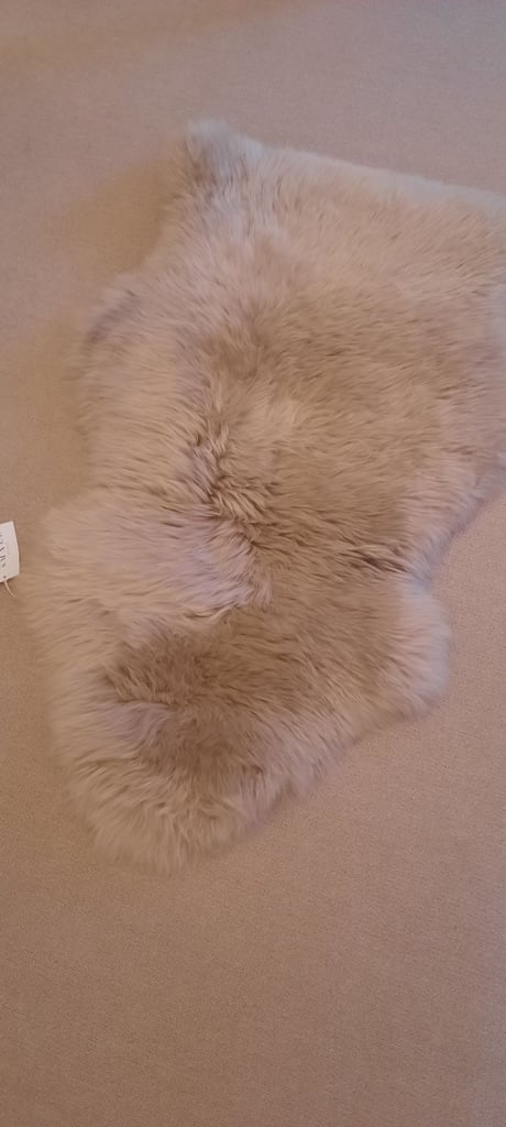 Brand new John Lewis sheepskin rug 