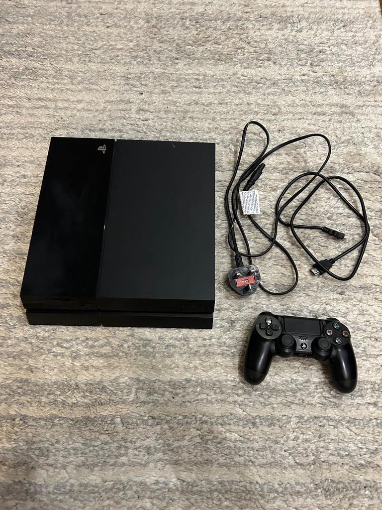 PS4 with controller and wires 