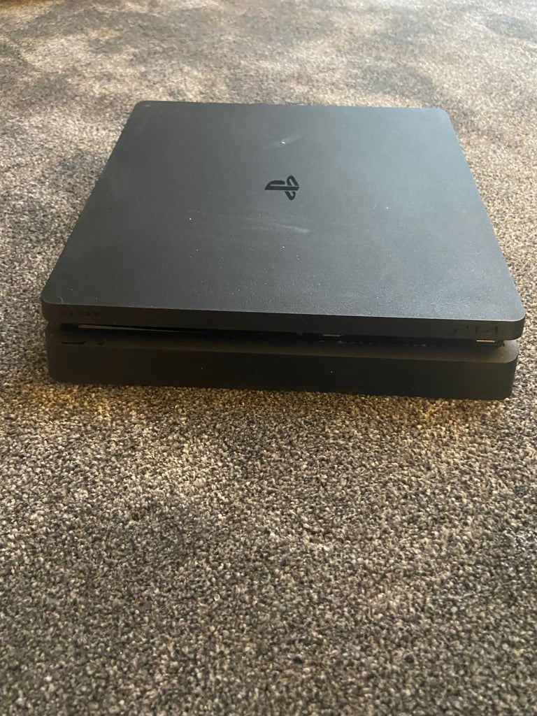 image for PS4 slim with 1 controller and cables