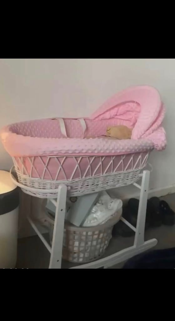 Pink Moses basket 
