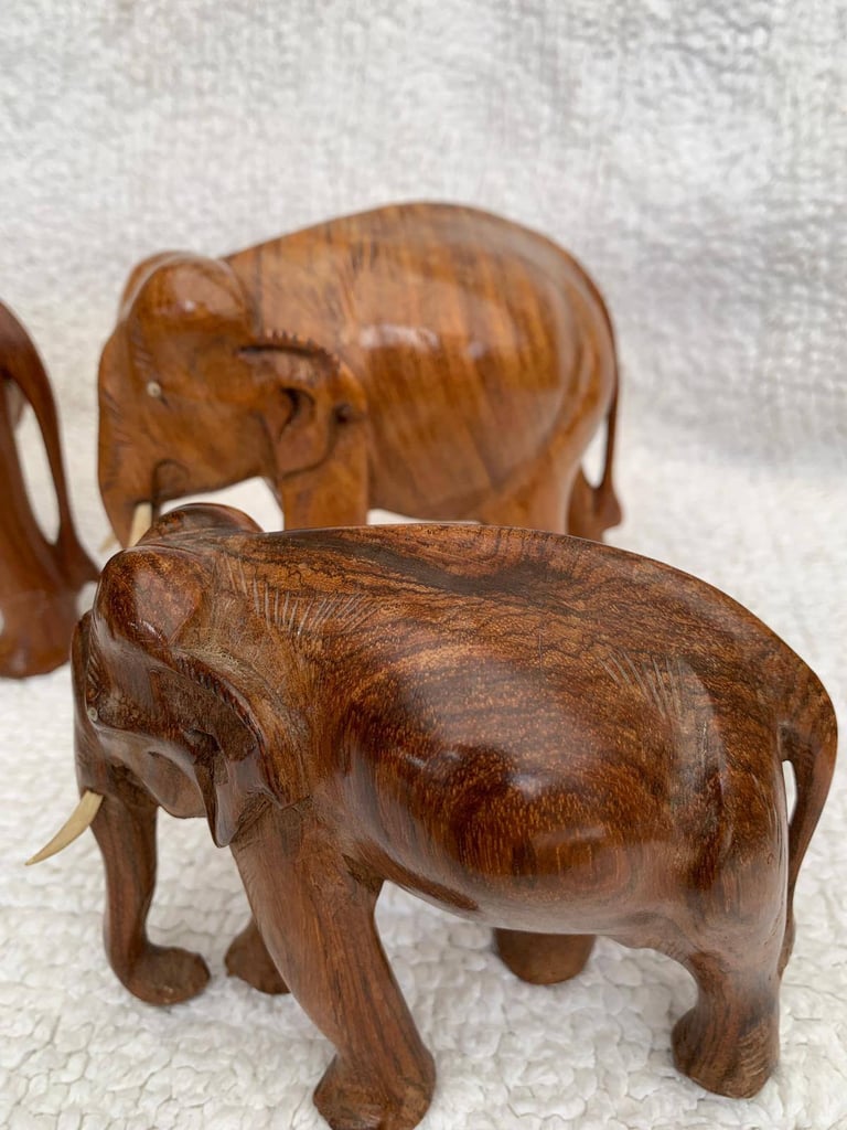 Teak elephants