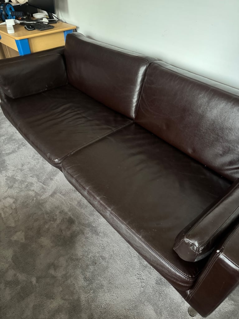2 Seater leather sofa and puffer table 
