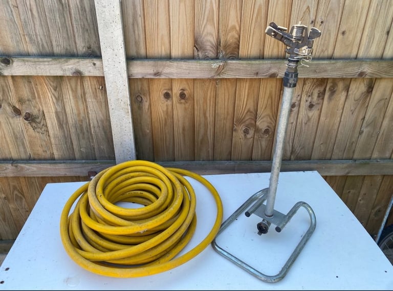image for Sprinkler and hose 