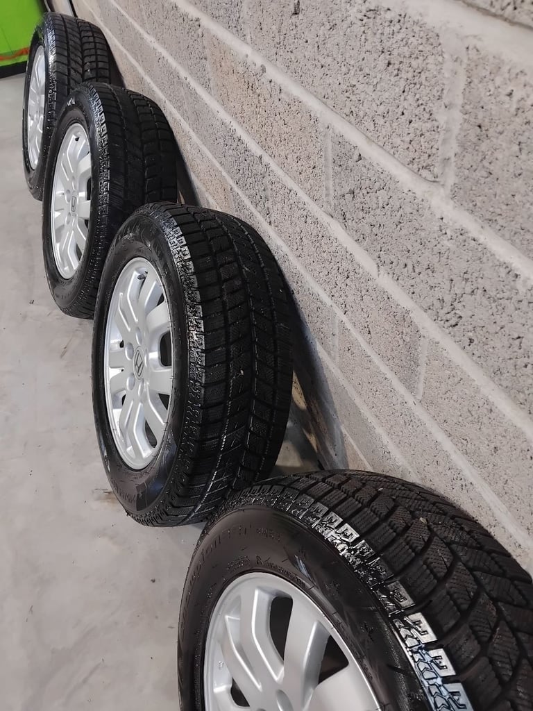 Genuine Honda CRV 16" Alloys with mud and snow tyres.