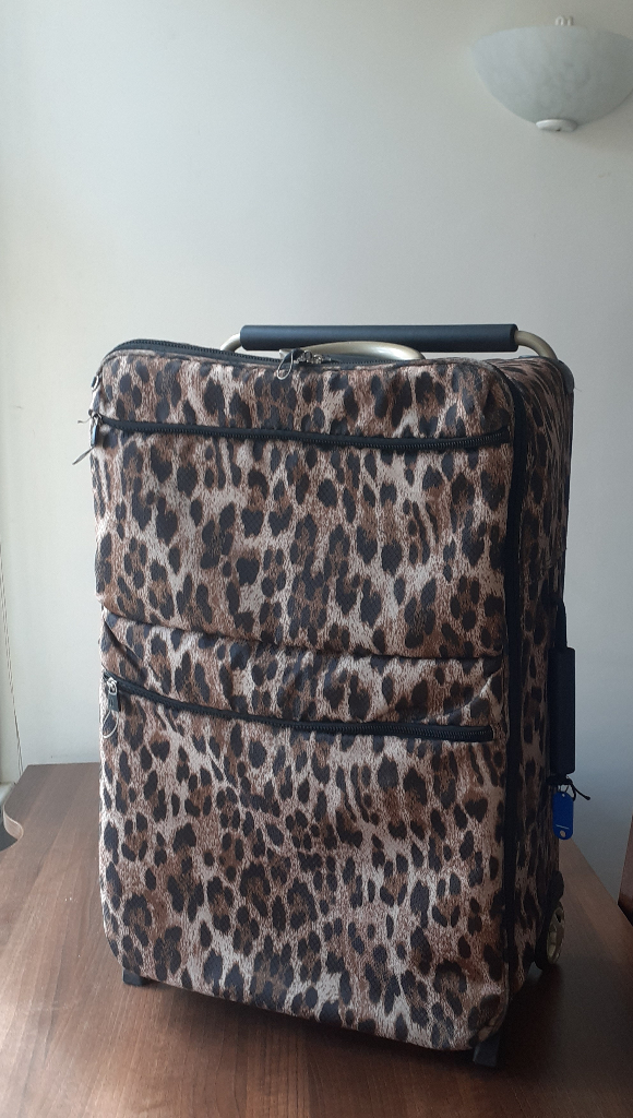 Matching pair of wheeled luggage in leopardskin print - stylish & functional