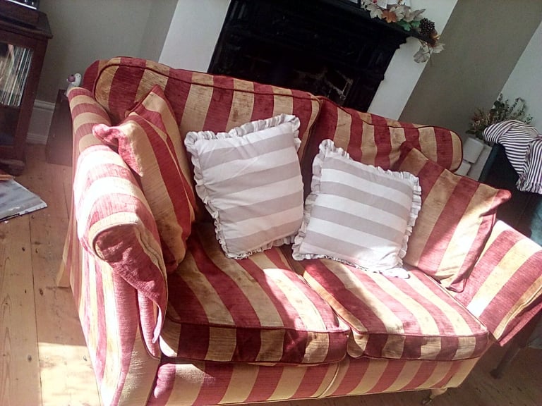 Red and gold striped sofa