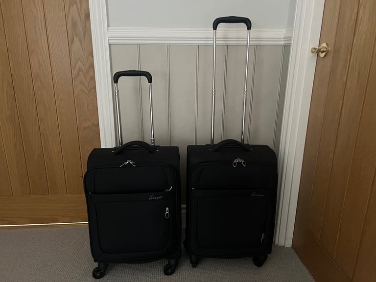 Two Black Linea Four Rotating Wheels, Cabin Cases, Used Once