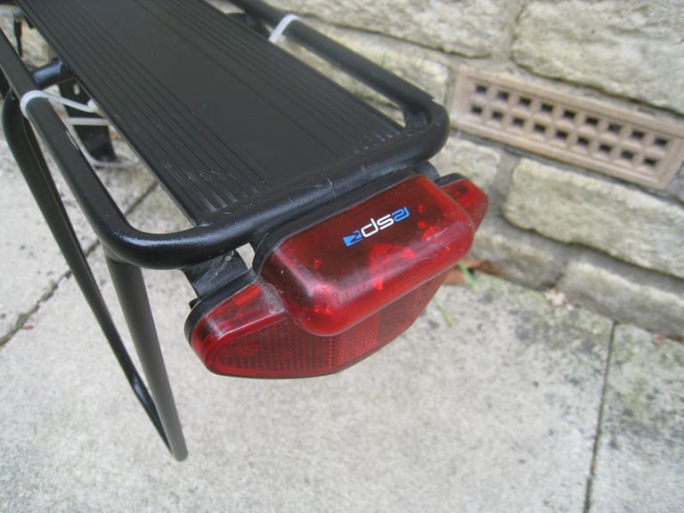 2 pannier racks £10 . tortec / led light 