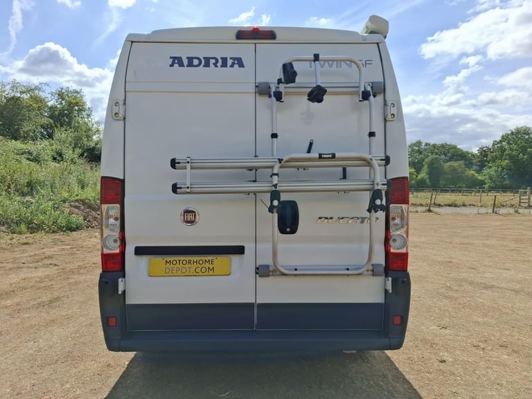 Adria Twin SF. 2013. Rear French Bed. Half dinette hosts 5.