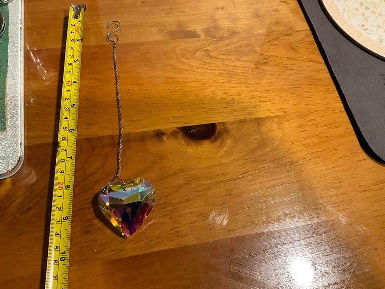 STUNNING CHRISTAL HEART. Prisms reflect the light and colours. Difference places different colours 