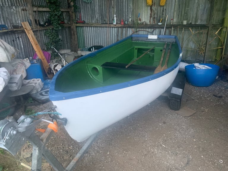 12 ft fibreglass boat and galvanised trailer 