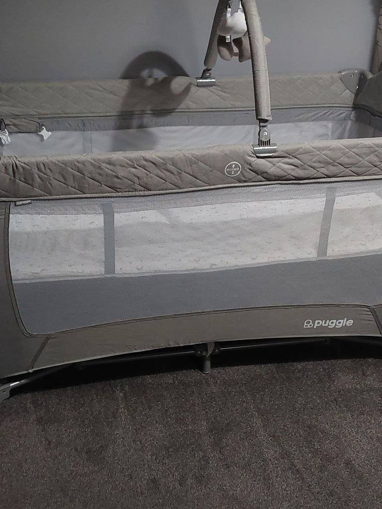 Brand new travel cot