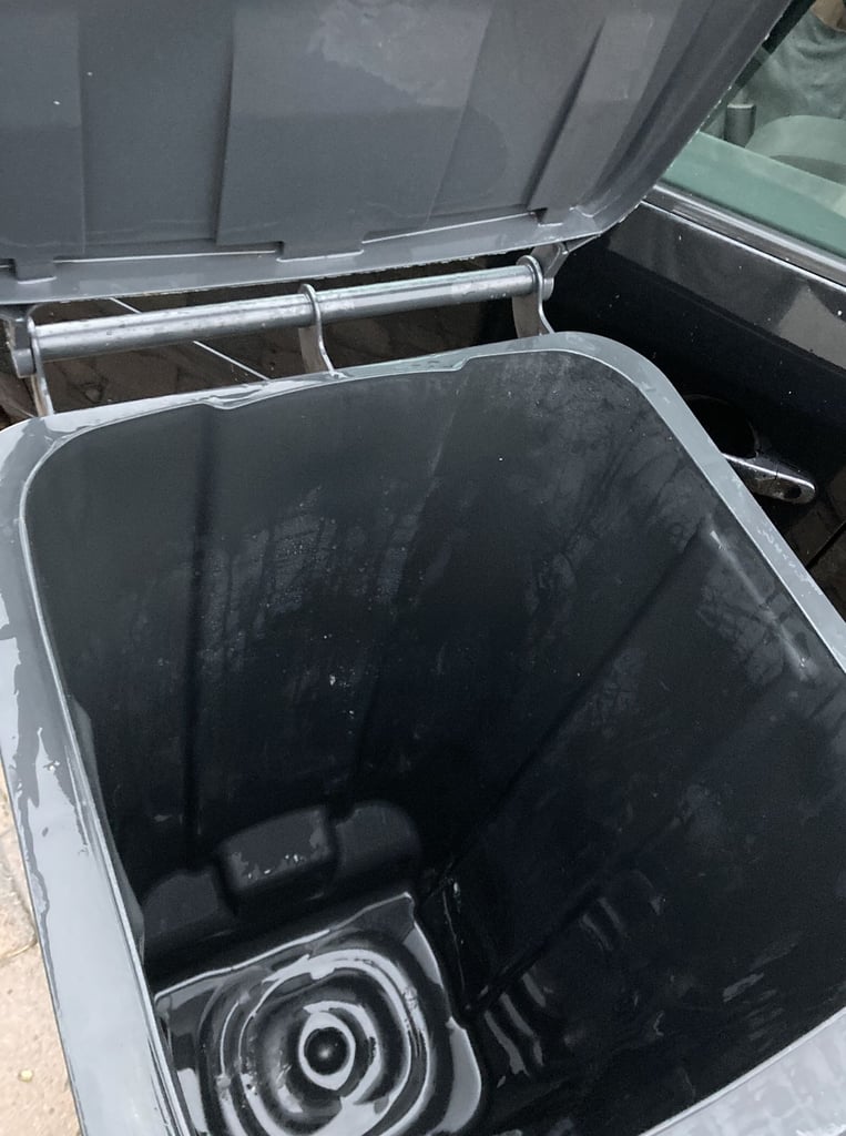 BLACK WHEELIE BIN hardly used