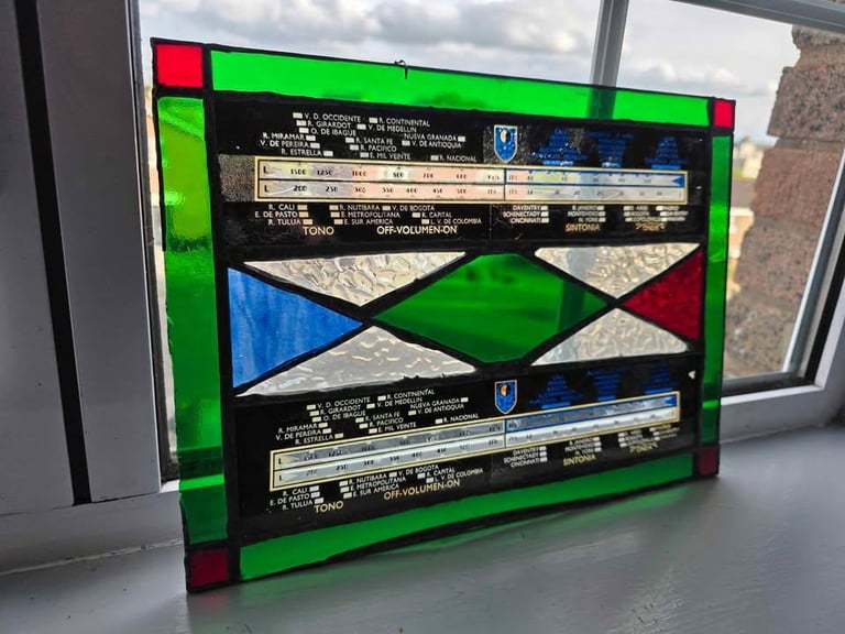 **£85** Stained Glass Panel, includes two sections from a vintage long range radio.