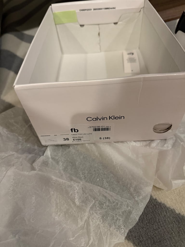 BRAND NEW CALVIN KLEIN TRAINERS 