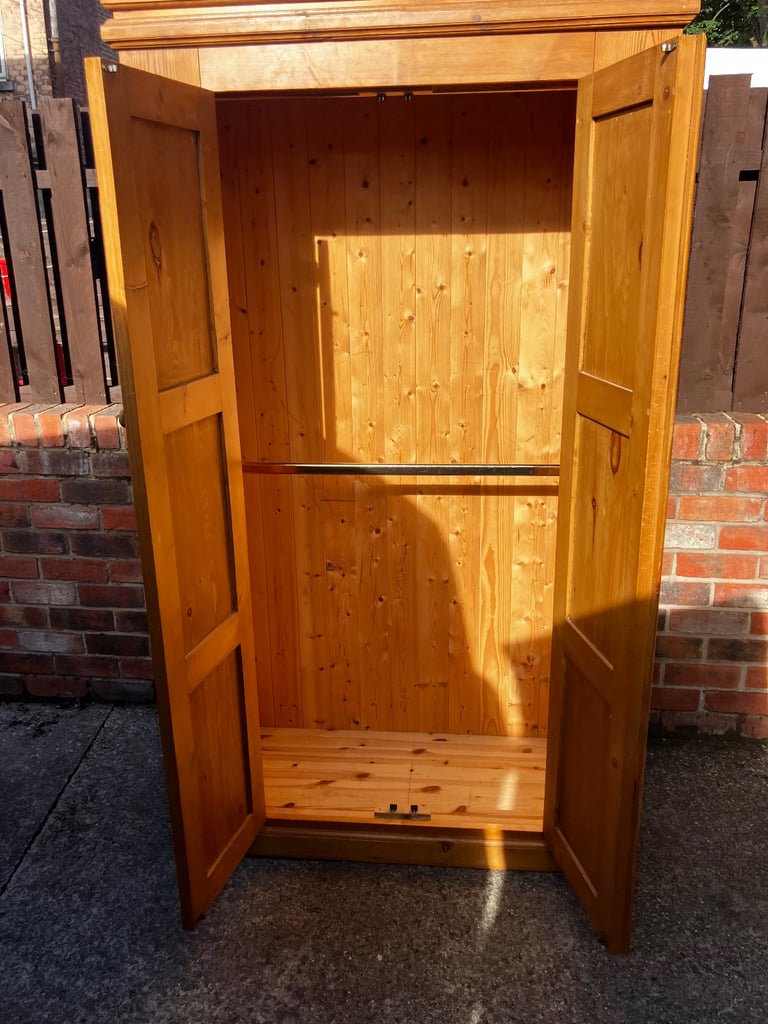Wardrobe solid pine very heavy & good quality double hand rails can deliver for small charge