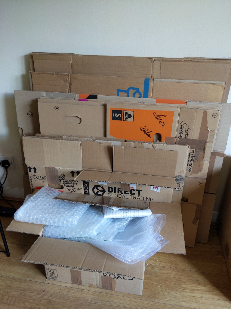 Moving Boxes: 5 boxes (6 already sold), various sizes + packing Materials