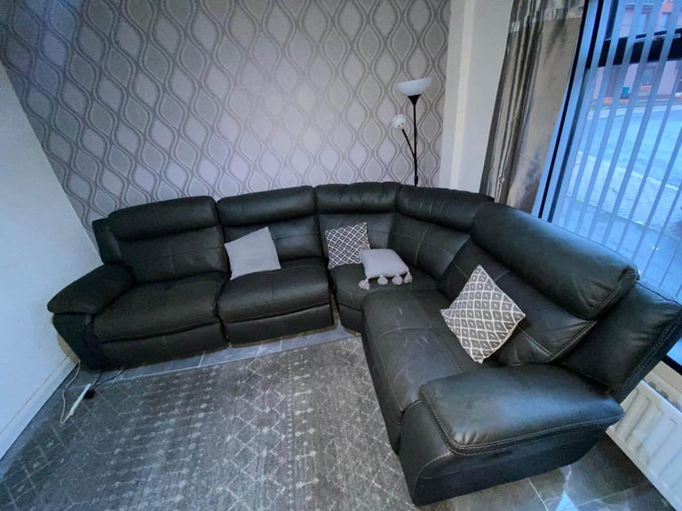 Modern corner group sofa   Some wee signs of wear and the recliner handle etc  £175