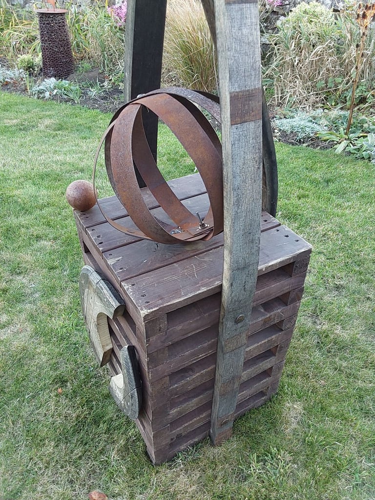 Garden art from whisky barrel materials 