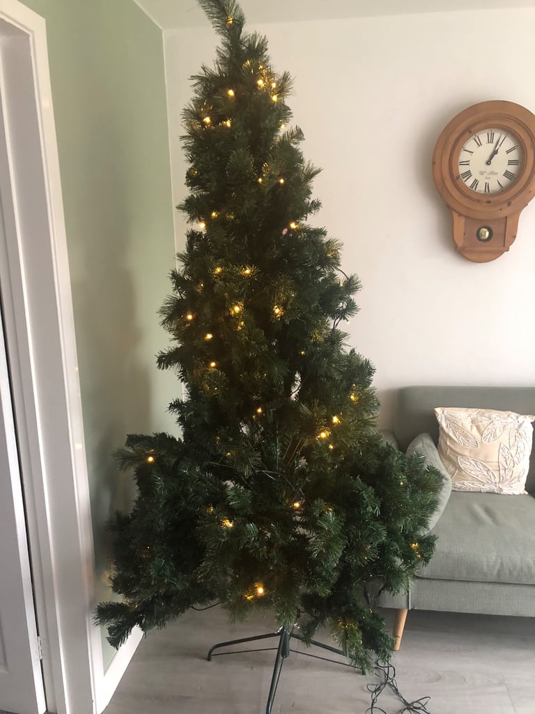 Pre-lit Majestic Dew Pine Christmas Tree complete with storage bag