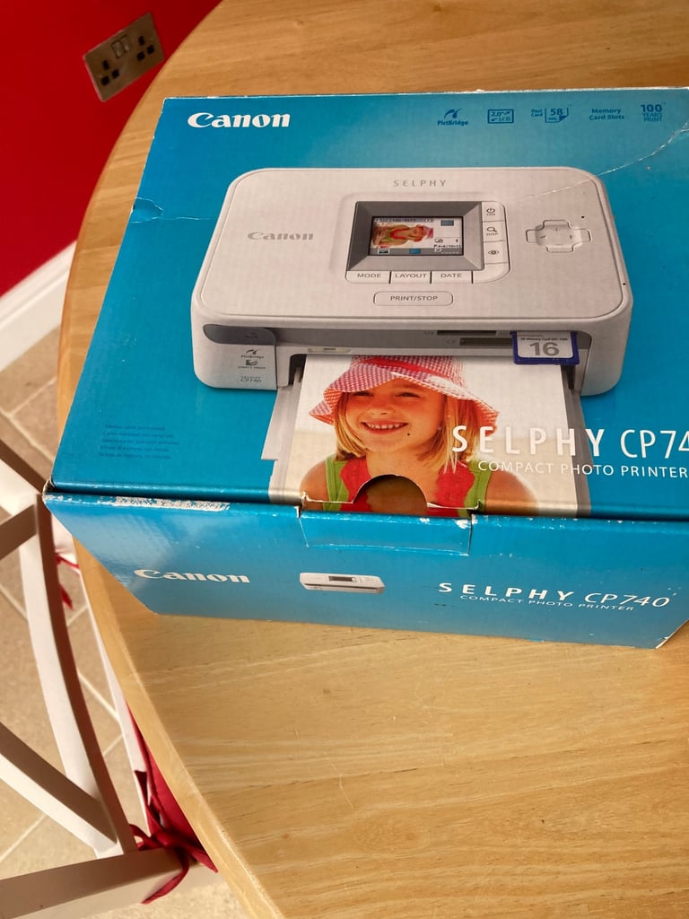 Cannon Digital IXUS 75 camera, Cannon Selphy CP740 compact photo printer and color ink cartidges