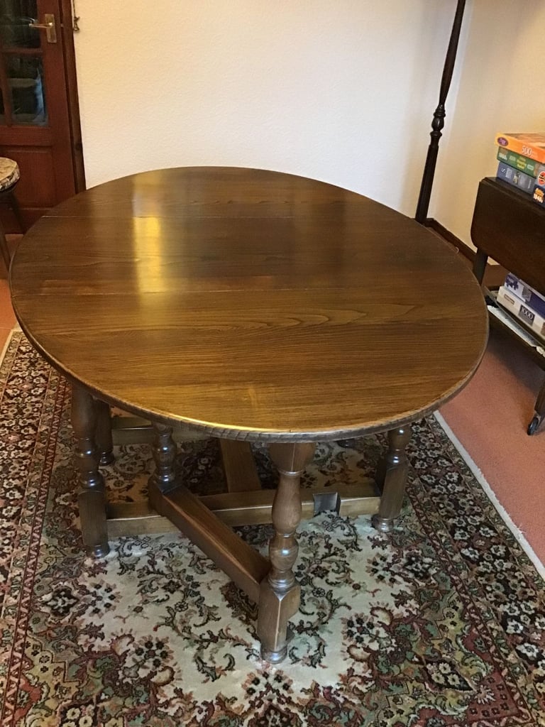 Ercol style Oval Dining Table, Gate Leg, Drop Leaf in Dark Oak