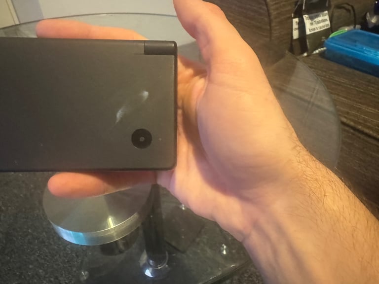 Great condition Nintendo DSI with 4 games, case and original stylus!