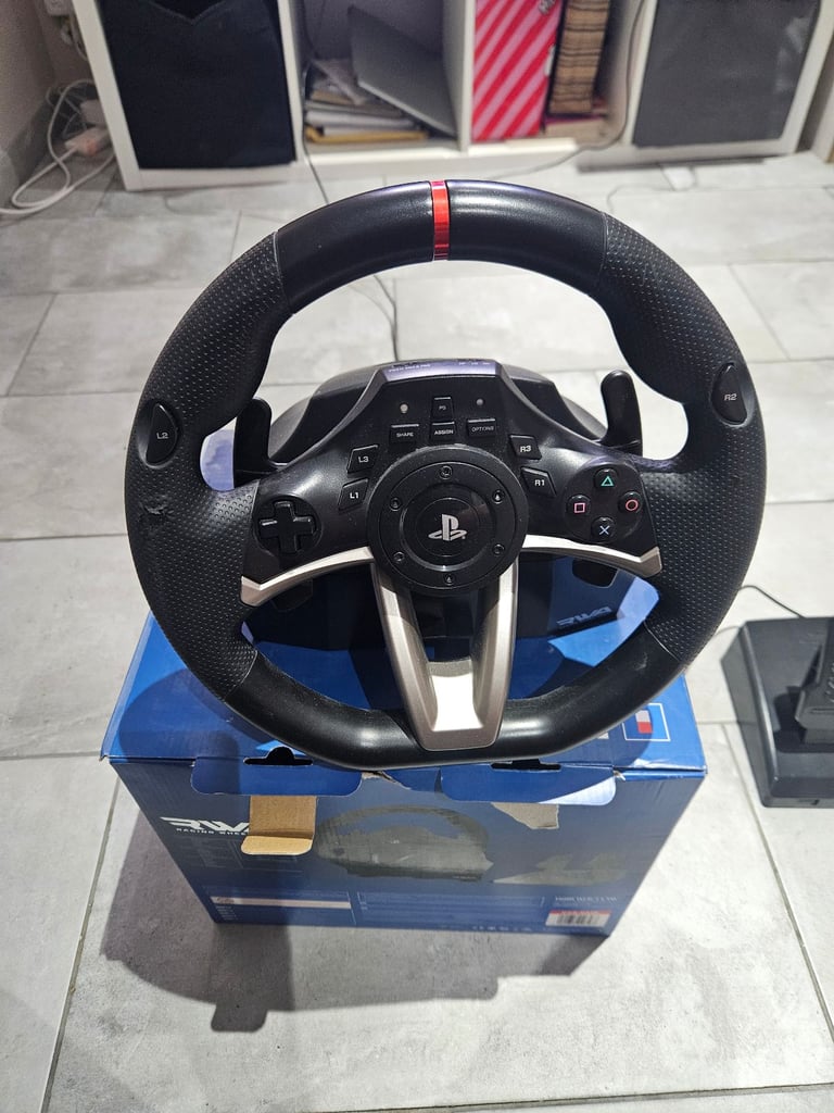 PlayStation 4 500gb with hori apex wheel and 23games