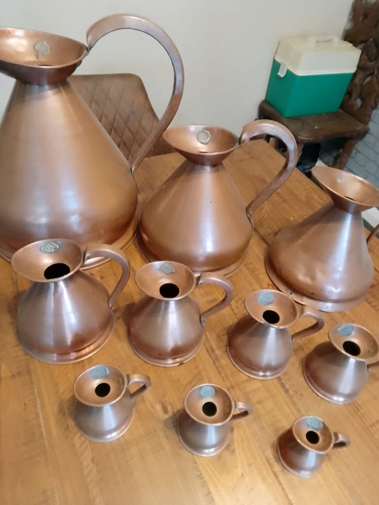 Vintage copper brass measure jug collection