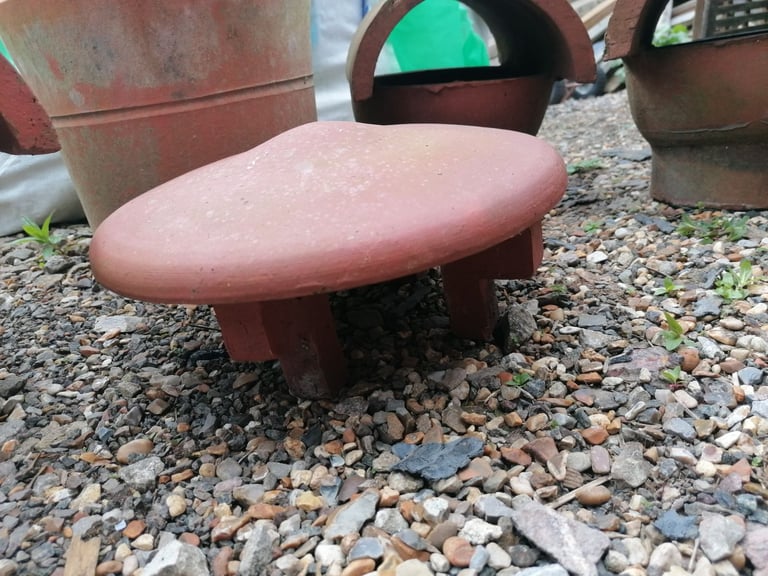 Terracotta chimney pots and top hat