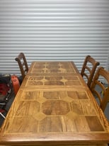 Oak inlayed table with 4 chairs