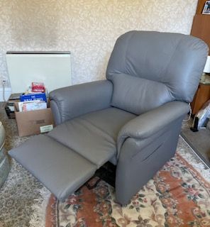 Dual motor rise and recline armchair.