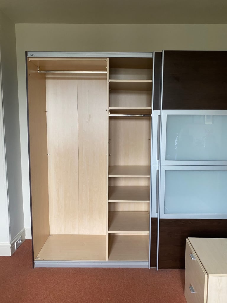 Free - Large wardrobe with sliding doors