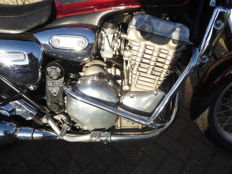TRIUMPH THUNDERBIRD 900 N REG OWNERS AND SERVICE BOOK VERY CLEAN BIKE