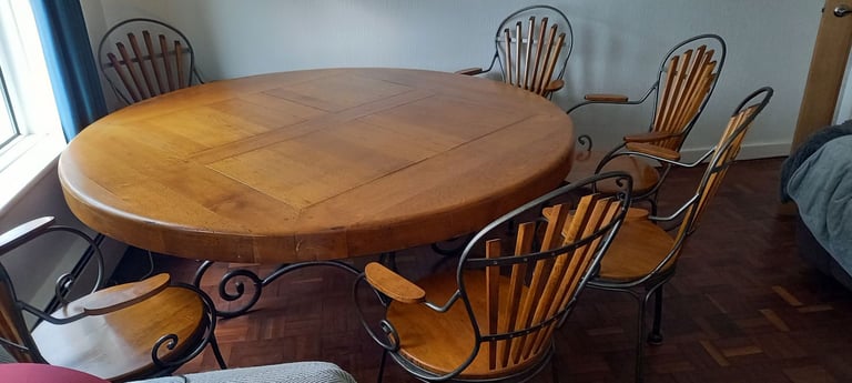 Solid oak round table and six chairs