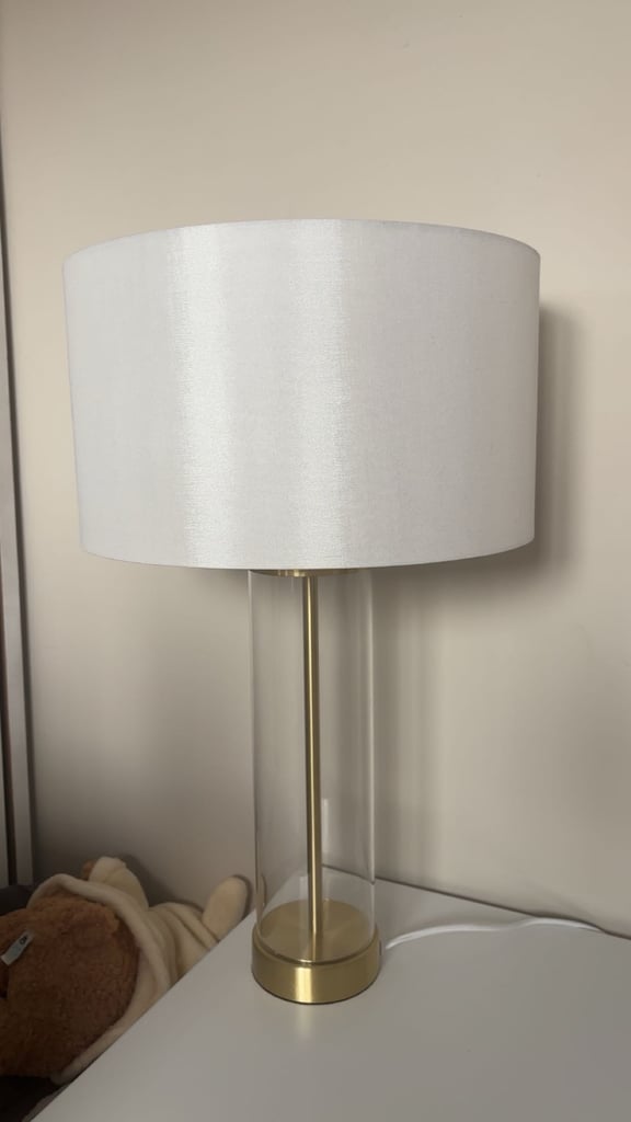 Gold and white bedside lamp