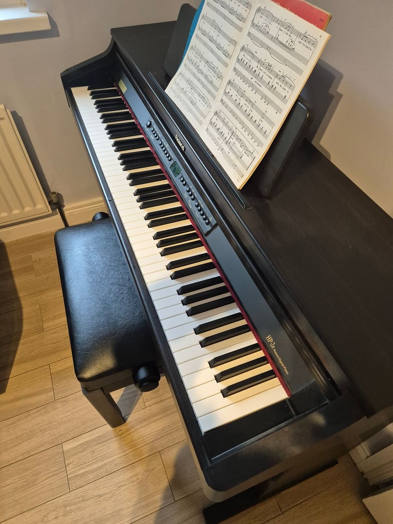 Roland HP-2e Digital Piano plus piano stool