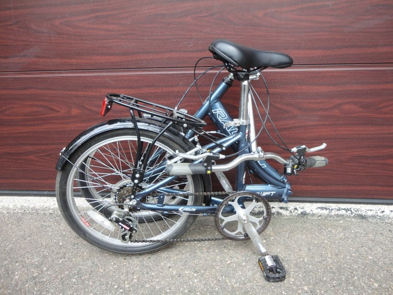 Raleigh swift folding bike, 20 inch wheels, 6 gears, aluminium frame, mud guards and rear rack
