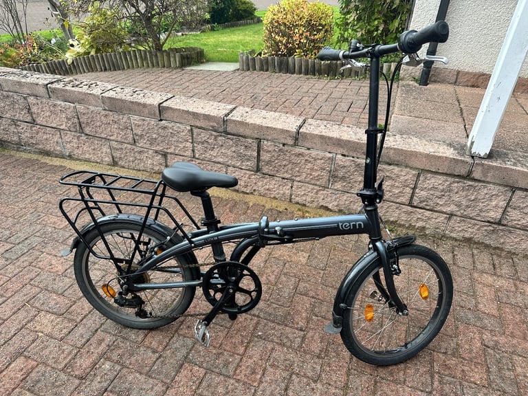 image for Tern folding bicycle with frame and pannier