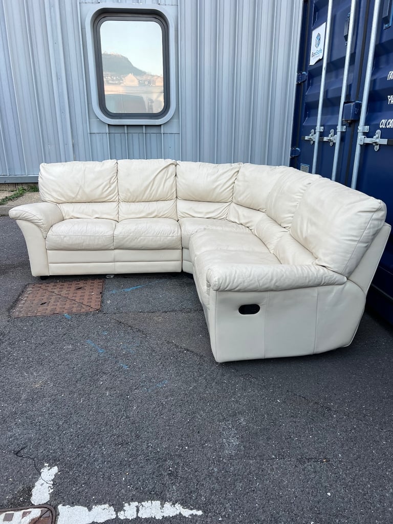 Cream leather corner sofa with recliner 