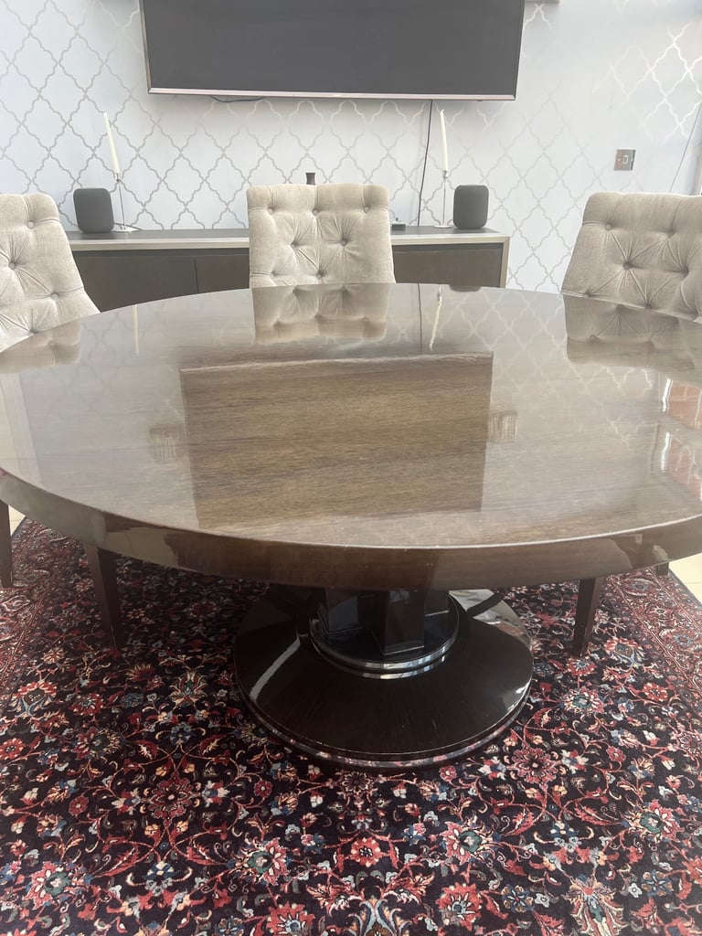 Luxury wooden dining table and velvet chairs 