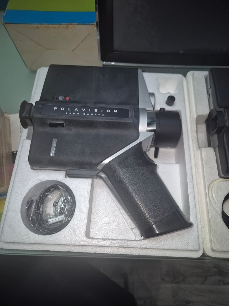Polaroid land cameras and player screen