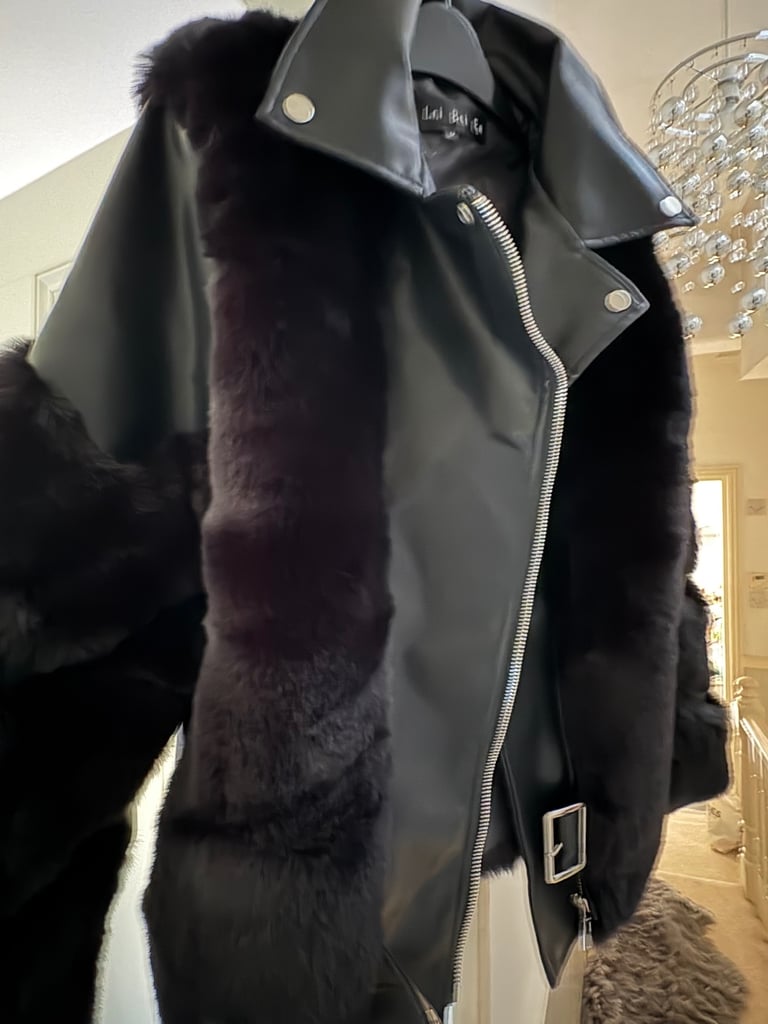 Brand new women’s biker style jacket with premium faux fur 