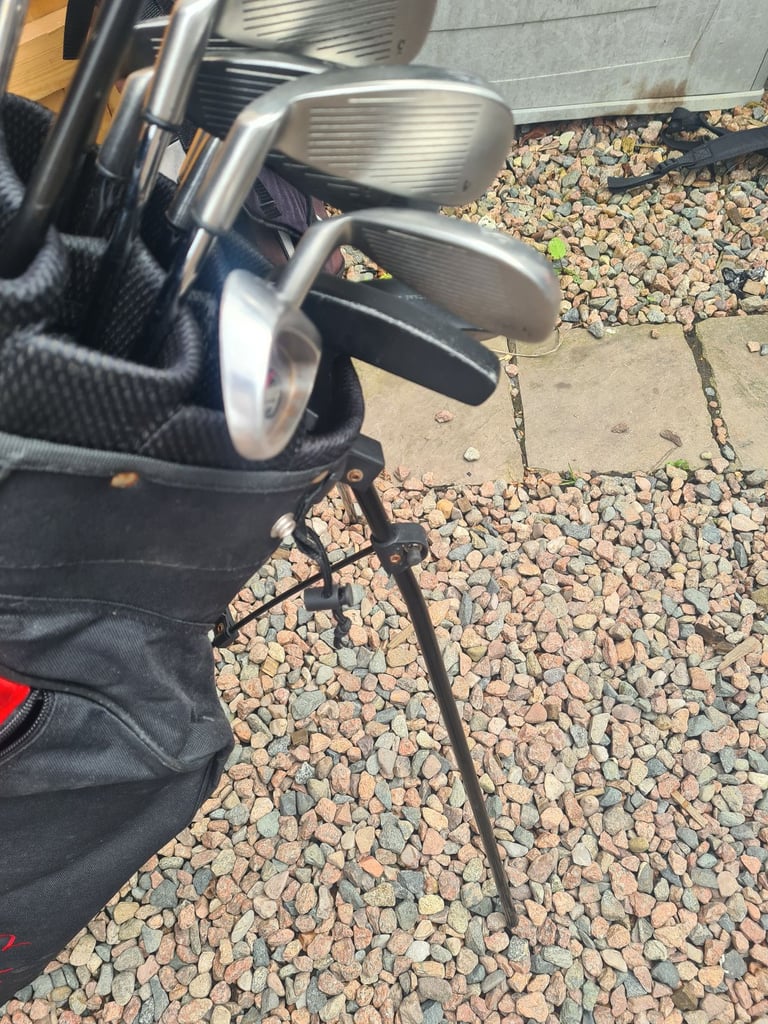 Full set of golf clubs.