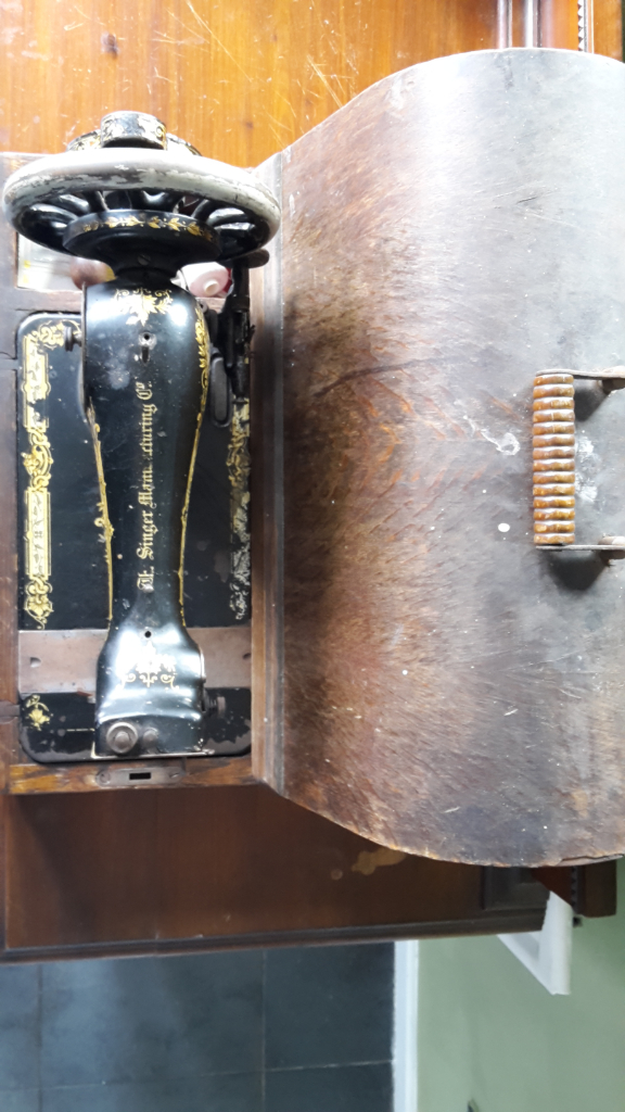 image for Vintage Singer sewing machine with case