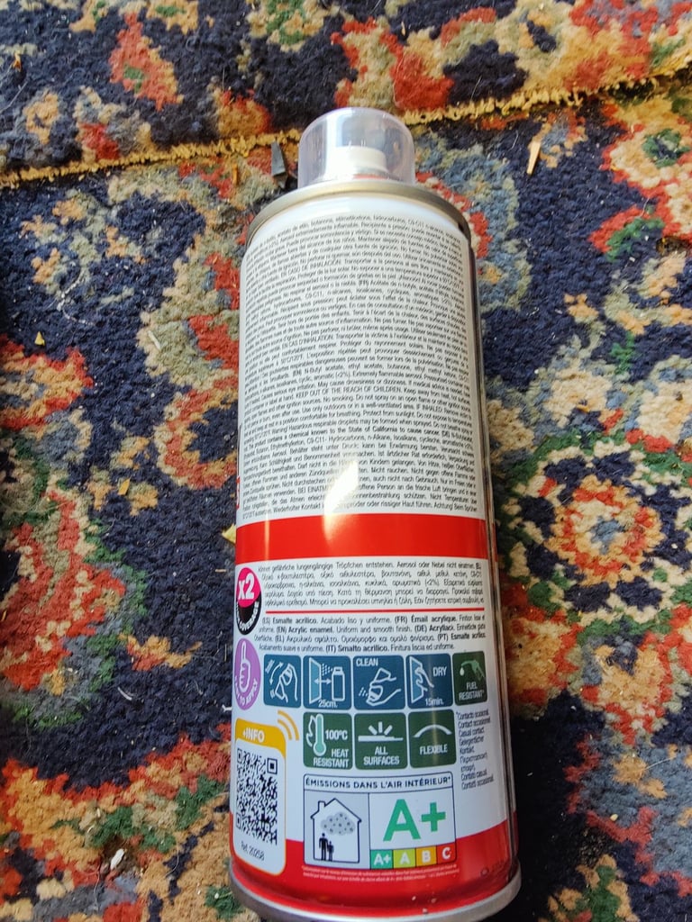 Spray paint orange. Acrylic paint tin