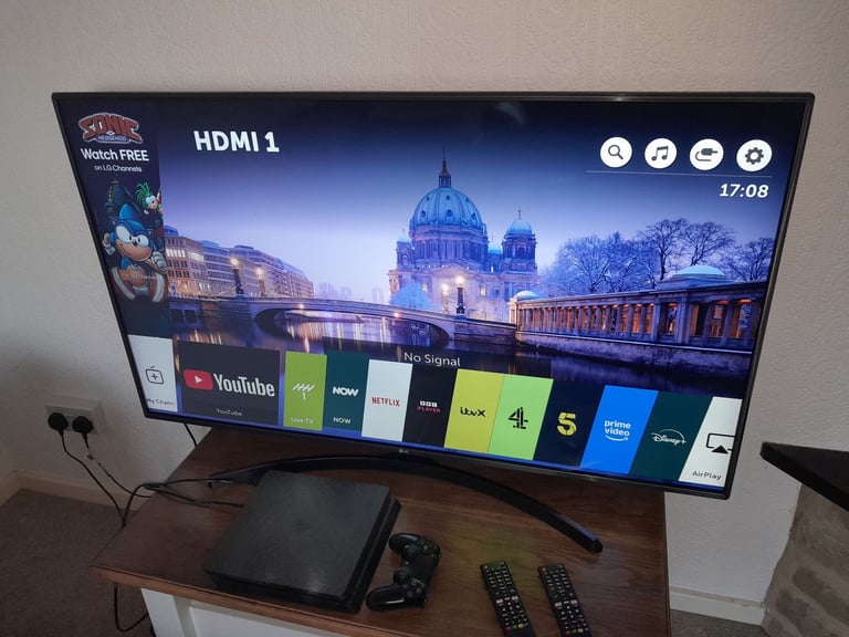 image for LG 55 inch 4K Ultra HD HDR Smart LED TV with two remotes
