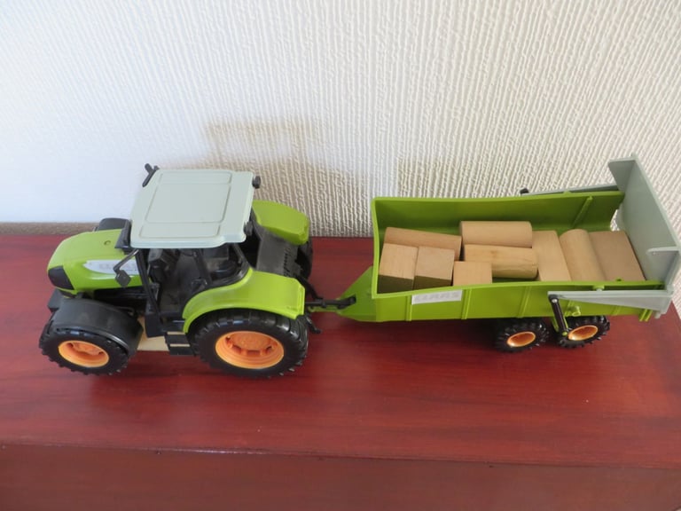 Tractor and trailer with wooden blocks