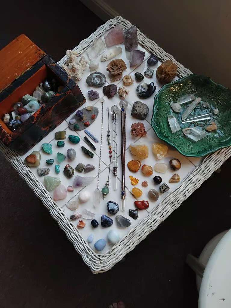 A Large Amount of Crystals, Some Natural, and Tumblestones, 2 Crystal Wands, and 2 Crystal Pendulums